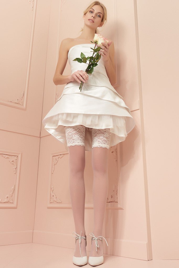 Elegant bride showcasing Trasparenze Athena 8 Den Luxury Thigh Highs, perfect for a classic bridal look.