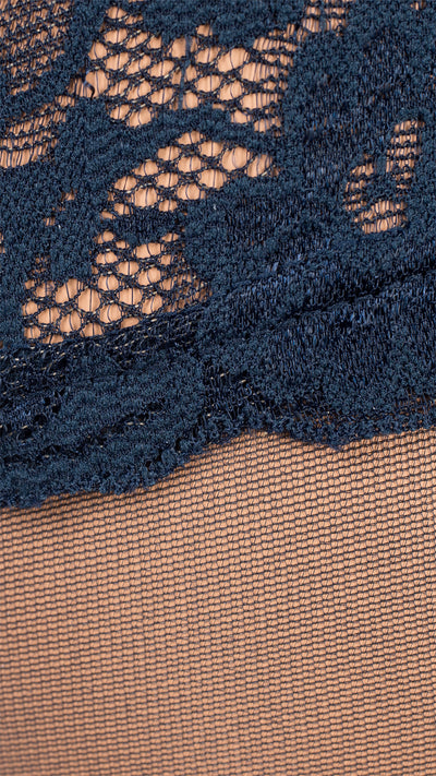 Elegant blue floral lace band atop sheer thigh high stockings for sophistication and allure. Shop Image 20 now!