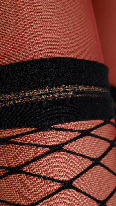 Eudoro Fishnet Over The Knee Tights feature a stylish design perfect for chic outfits and elegant occasions.