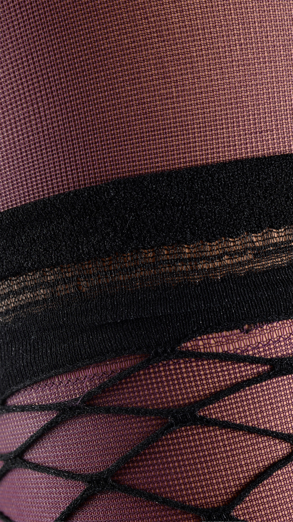 Eudoro Fishnet Over The Knee Tights showcase chic style with elegant detailing and bold design for a stunning look.