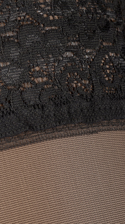 Fanny 15 Den Lace Top Thigh Highs showcase elegant lace detailing for a captivating look. Perfect for any evening.