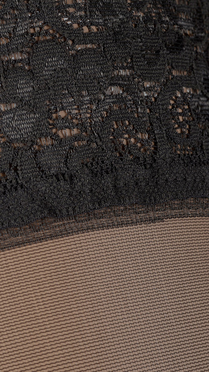 Fanny 15 Den Lace Top Thigh Highs showcase elegant lace detailing for a captivating look. Perfect for any evening.