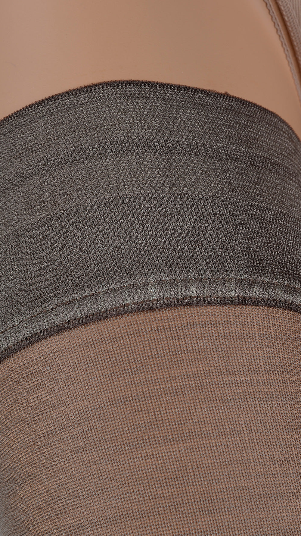 Luxurious Jennifer 100 Den Merino Wool Thigh Highs by Trasparenze feature a cozy 6.5cm plain top for cooler days.