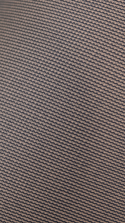 Katia 15 Den Ultra Soft Pantyhose showcasing a delicate net pattern, ideal for everyday elegance by Trasparenze.