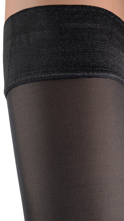 Elevate your style with Miranda 70 Den Opaque Thigh Highs, perfect for any elegant occasion.