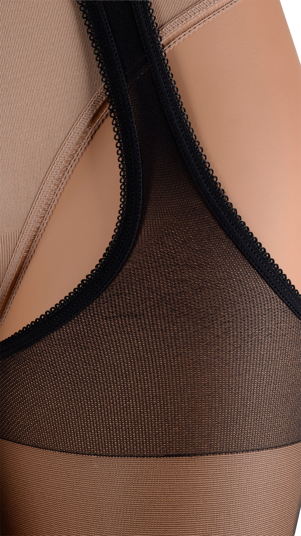 Discover allure with Scandal 20 Den Strip Panty Suspender Pantyhose, enhancing your curves and confidence.