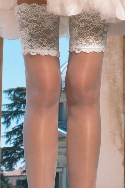 Elegant Trasparenze Athena 8 Den Luxury Thigh Highs feature beautiful lace detailing, perfect for a bridal look.