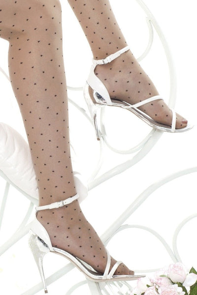 Elegant Trasparenze Caipirinha Polka Dot Pantyhose featuring black dots on a nude background, perfect for any occasion.