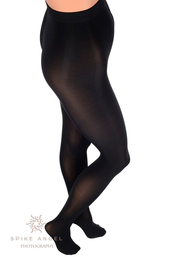 Cortina 100 Den Soft Opaque Tights offer a sleek look with a soft sheen, perfect for a glam winter style.