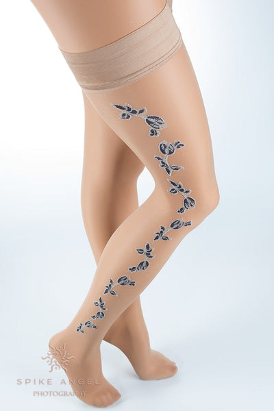 Enea Floral Shiny Hold Up Thigh Highs by Trasparenze offer a sleek, shiny finish for flawless legs.