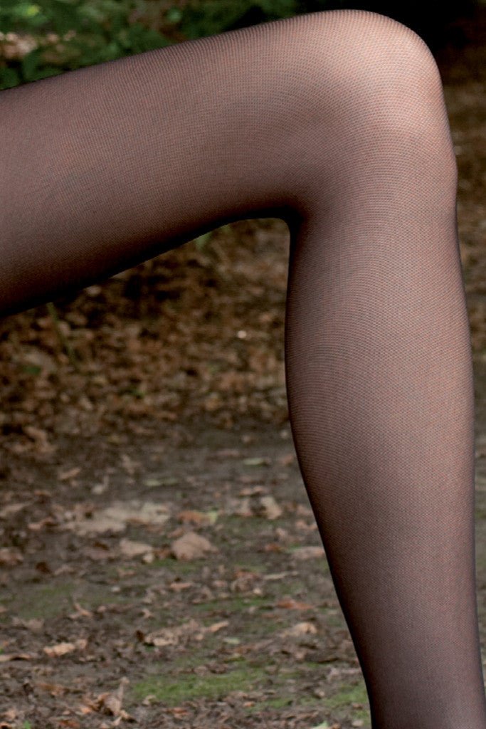 Elevate your style with Hannah 20 Den Micro Tulle Pantyhose, perfect for effortless elegance in any setting.