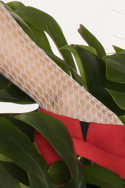 Stylish Trasparenze Muricata Geometric Fashion Tights featuring an open knit design and over-the-knee style.