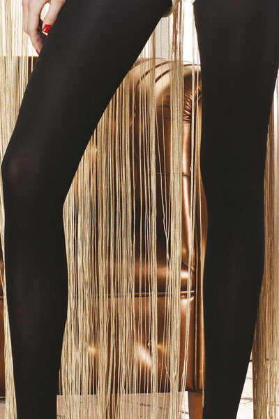 Stylish legs wearing Trasparenze Pile Opaque Soft Tights, perfect for any occasion and a wardrobe essential.