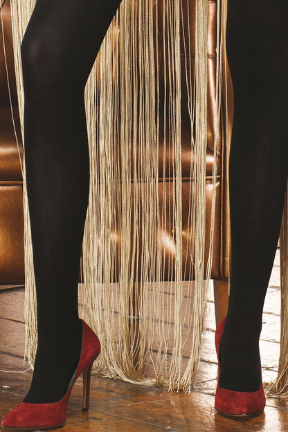 Stylish legs adorned in Trasparenze Pile Opaque Soft Tights, perfect for any fashionable outfit.