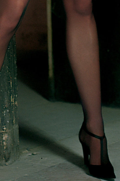 Stylish legs in Trasparenze Rosy 20 Den Silky Sheer Pantyhose, perfect for chic, affordable elegance.