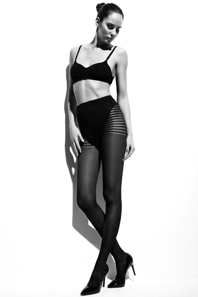 Stylish model wearing Silhouette 120 Derm Support Pantyhose 12-16 mmHg 15-21 hPa by Ibici for comfort and support.