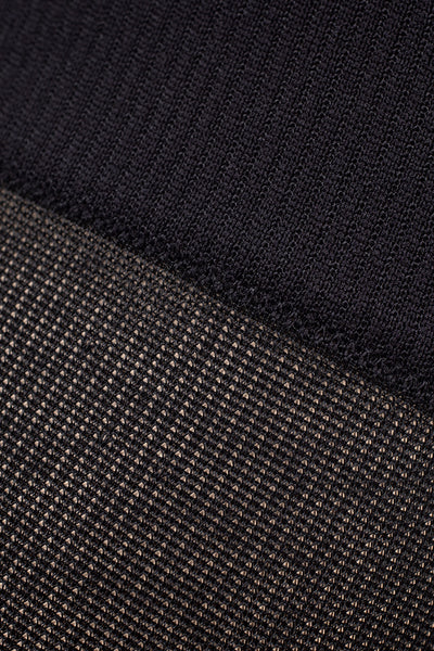 Close-up of black breathable fabric texture on Ibici Skywalk Light Compression Socks 11-14 mmHg 15-19 hPa for comfort.
