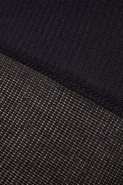 Close-up of black breathable fabric texture on Ibici Skywalk Light Compression Socks 11-14 mmHg 15-19 hPa for comfort.