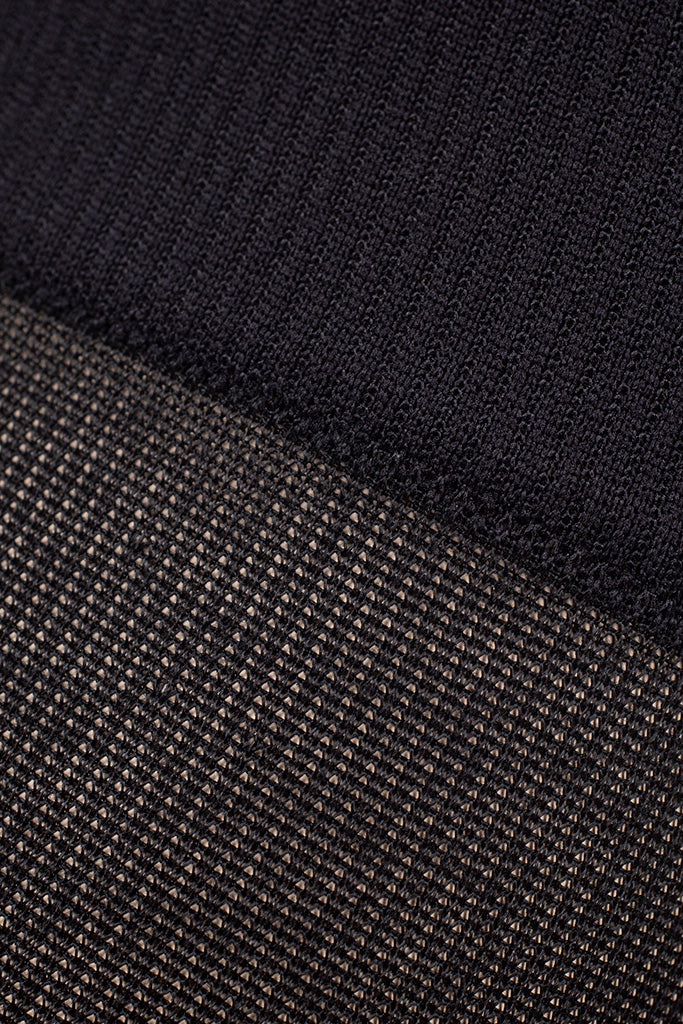 Close-up of black breathable fabric texture on Ibici Skywalk Light Compression Socks 11-14 mmHg 15-19 hPa for comfort.