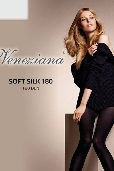 Veneziana Soft Silk 180 Opaque Silk Blend Tights worn by model in black sweater for chic, stylish look.